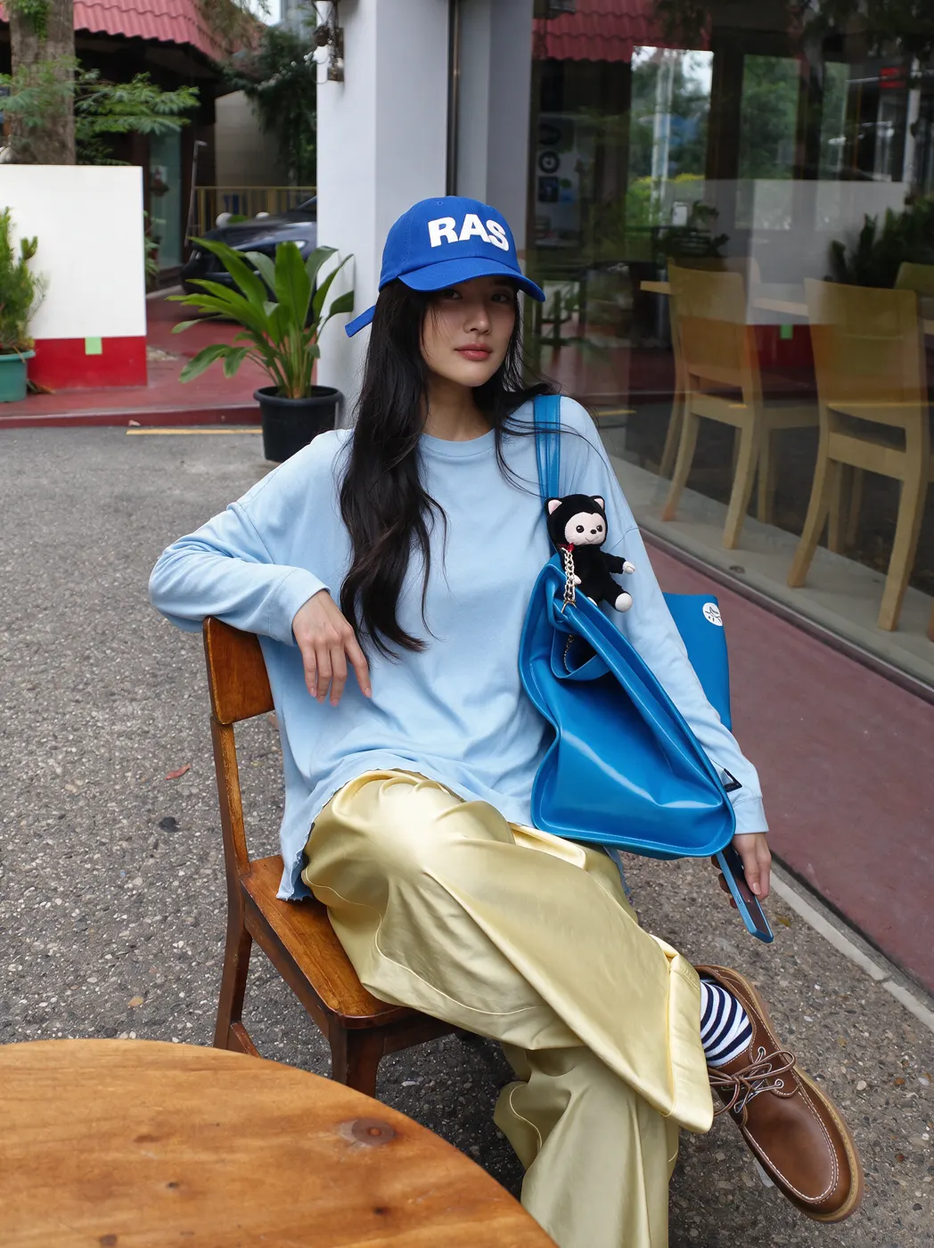 Everyday fashion styling in a casual lifestyle setting, view 34