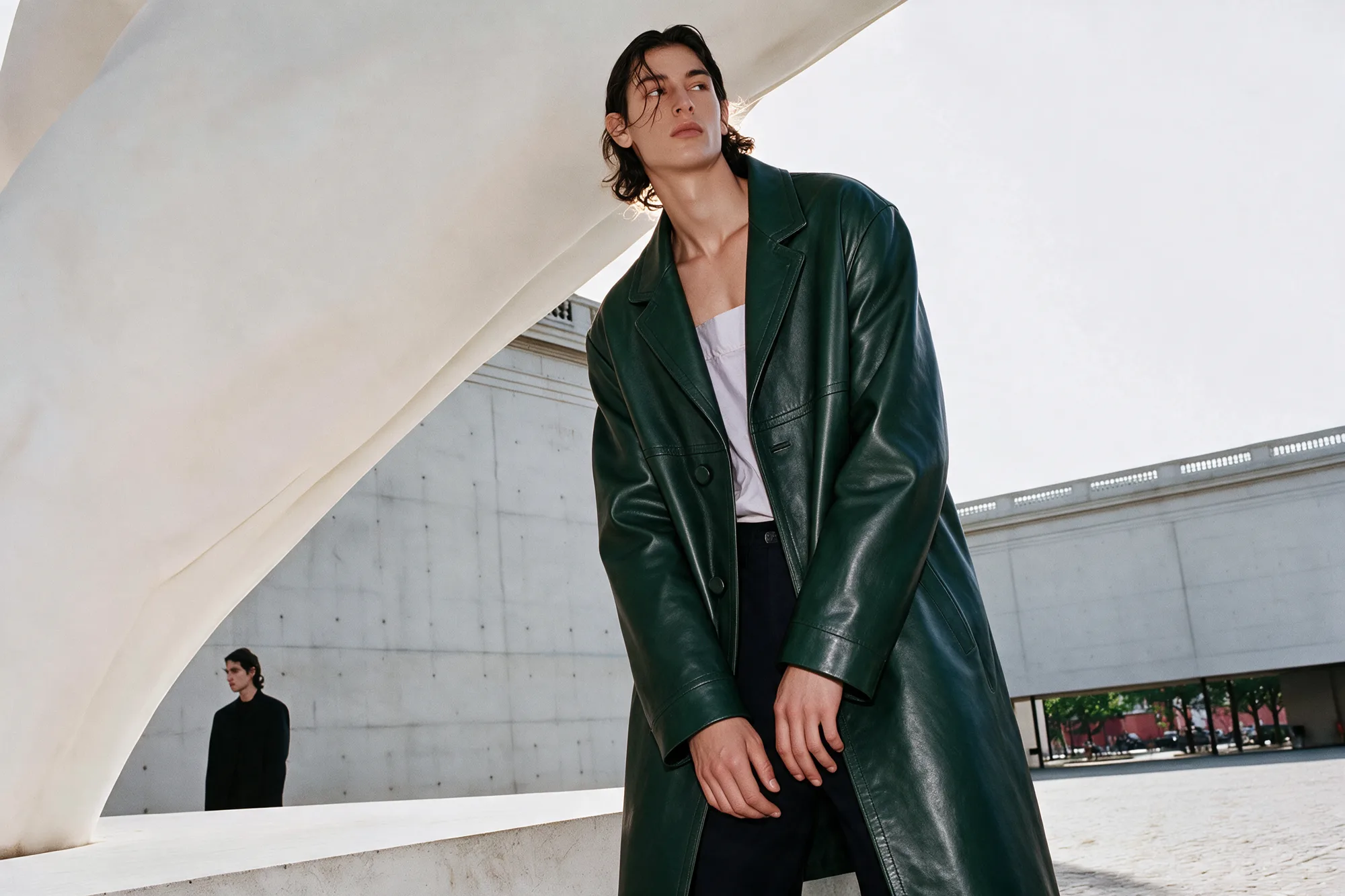 Prada-inspired fashion campaign in an architectural setting, view 01
