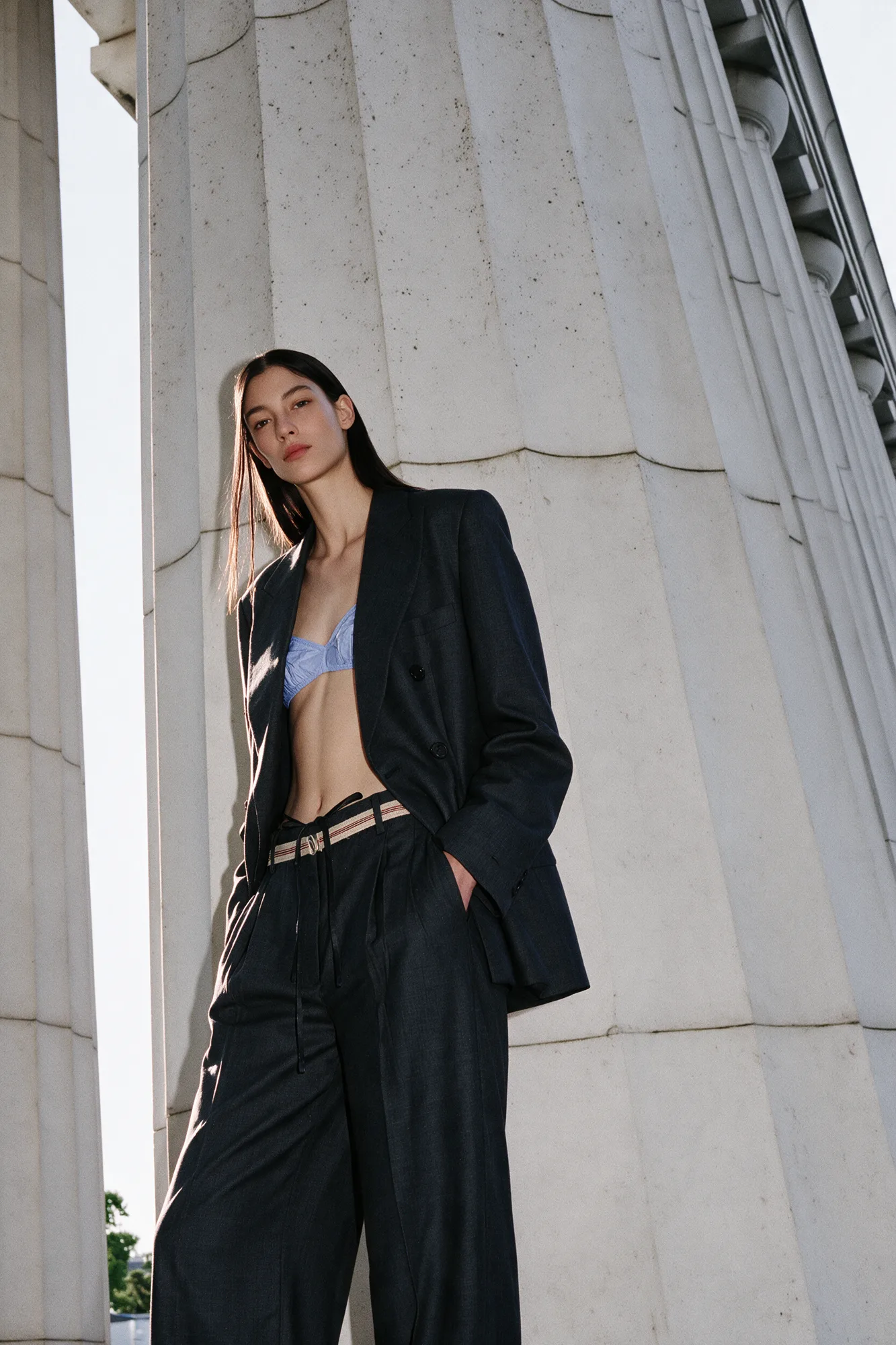 Prada-inspired fashion campaign in an architectural setting, view 02