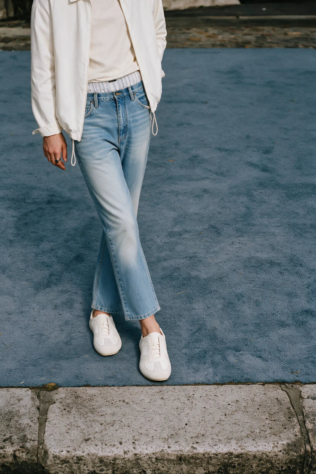 White trainers in a casual outdoor lifestyle setting