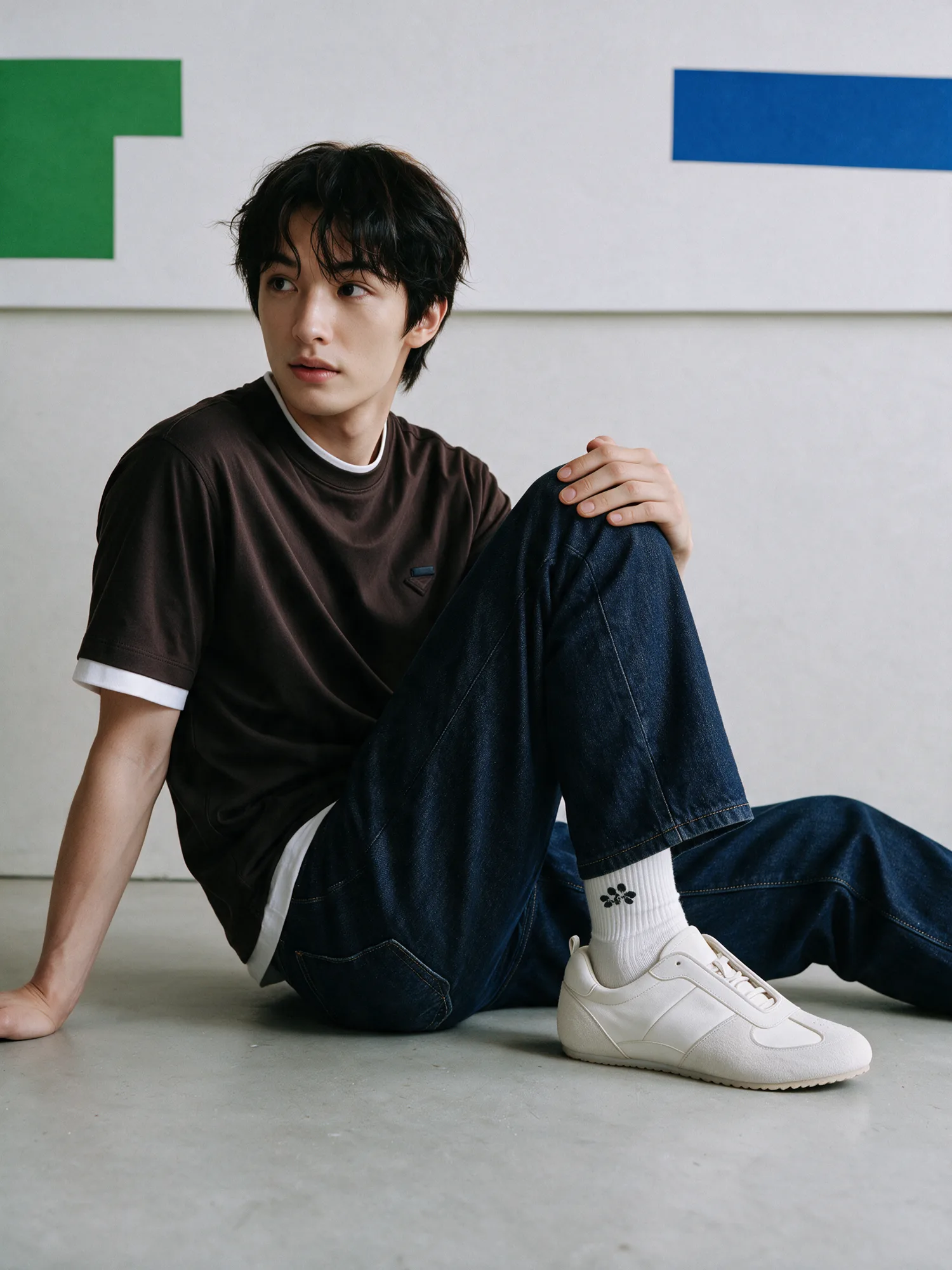Full model look styled around white trainers